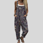 Graue Latzhose mit bunten Blümchen von Stefanie Berlin